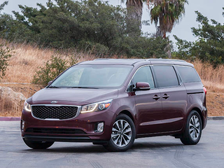 The wife finally got her minivan wish and realized her true destiny. This is a great road trip car.